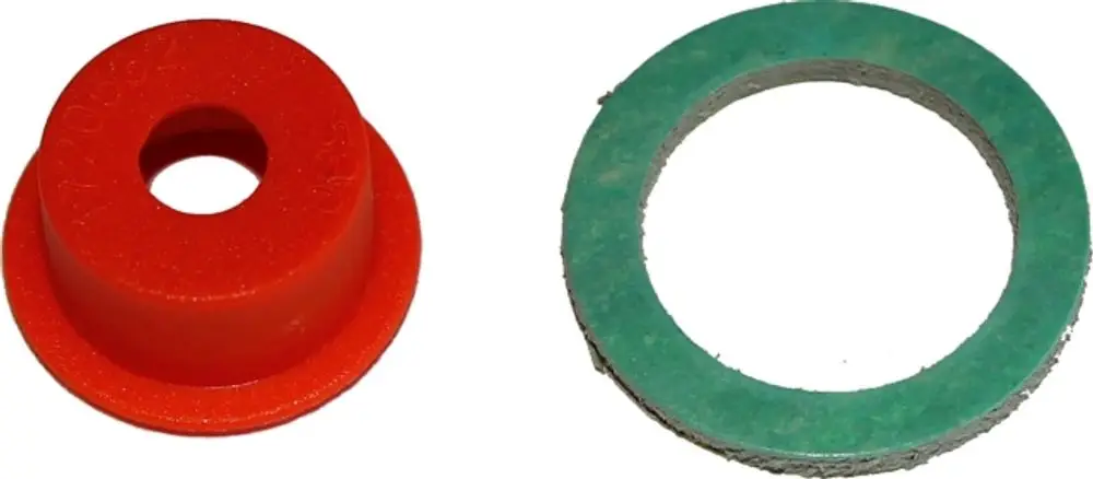 Zwei Dichtungen von Wolf: eine rote gummierte Dichtung mit einem Loch in der Mitte und eine grüne, flache Dichtung. Beide Teile scheinen für Gasanwendungen geeignet zu sein.